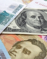 Курс доллара опустился ниже 50 рублей