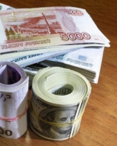 Доллар и евро растут на Московской бирже
