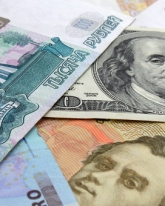 Доллар и евро незначительно изменились к рублю при открытии торгов