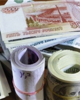 Доллар незначительно теряет в цене