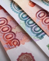 Доллар незначительно растет в паре с рублем