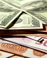 Доллар растет, евро снижается