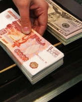 Доллар подешевел на 19 копеек