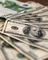 Рубль торгуется почти без изменений