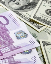 Доллар и евро растут в начале торгов в пятницу