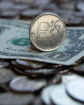 Рубль окреп на 58 копеек