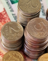 Рубль растет в ходе сегодняшних торгов