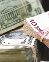 Доллар потерял еще 46 копеек