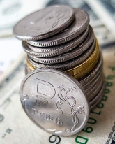 Почему рубль растет?