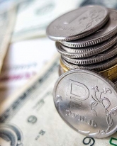 Рубль вырос на 17 копеек