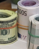 Доллар упал на 46 копеек