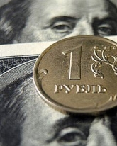 Рубль укрепляется вслед за подъемом нефтяных цен
