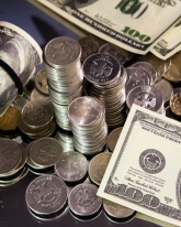 Доллар подорожал еще на 9 копеек