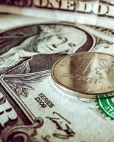 Доллар упал на 65 копеек в четверг