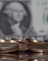 Доллар просел на 7 копеек