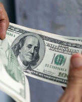 Доллар прибавил еще 3 копейки