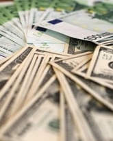 Доллар прибавил 18 копеек