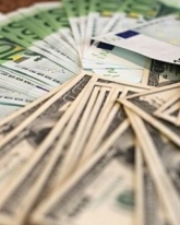 Доллар подорожал на 55 копеек