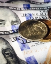 Доллар просел на 11 копеек