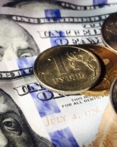 Доллар прибавил еще 59 копеек