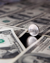 Доллар прибавил 13 копеек