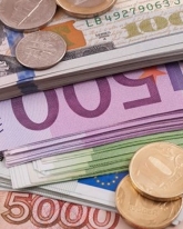 Доллар потерял сразу 84 копейки