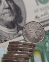 Доллар поднялся на 70 копеек в среду