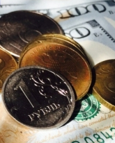 Доллар поднялся на 27 копеек