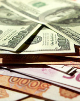 Доллар прибавил 1,5 рубля