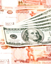 Доллар потерял еще 79 копеек