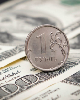 Доллар потерял 18,5 копейки