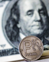 Рубль растет к доллару и евро на стоимости барреля нефти