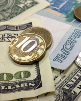 Доллар просел на 53,5 копейки