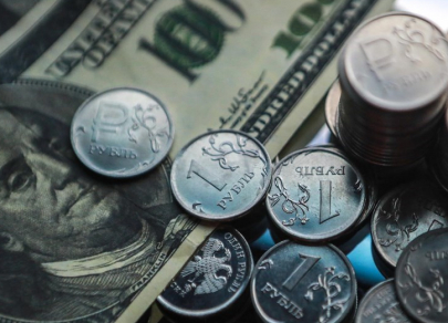 Рубль терпим к доллару на базе 18 июня