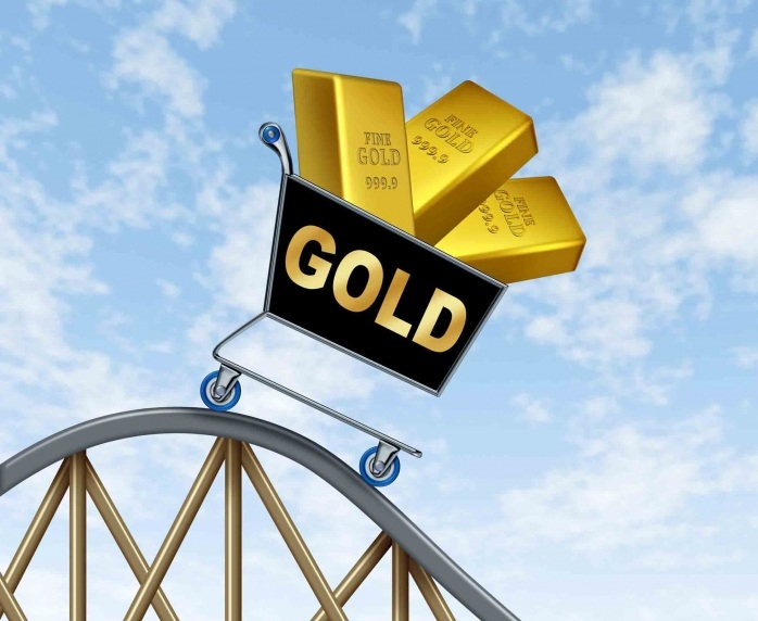 Цена золота снижается на фоне роста курса доллара США