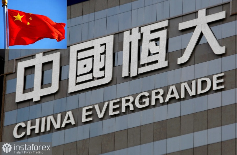 China Evergrande Group увеличила темп выплаты долга