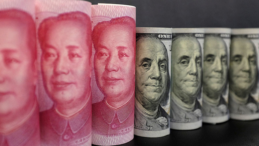 Переможця визначить час: протистояння долара та юаня 