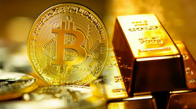 Fed tăng lãi suất không ảnh hưởng đến vàng và bitcoin