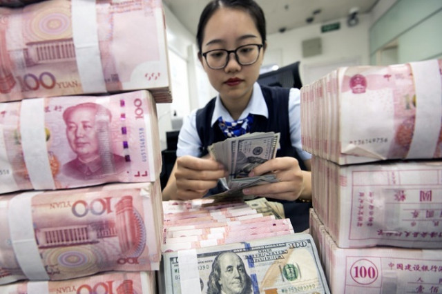 Китай встановив фіксований курс юаня 6,9116 