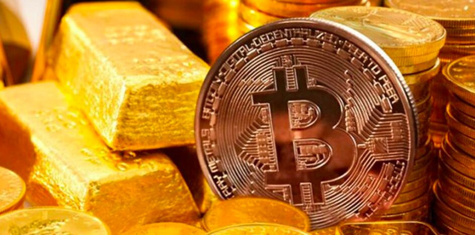 L'oro vince su dollaro e Bitcoin? Clamorosi record del Gold